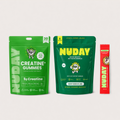 NUDAY supplement packages including Creatine+ Gummies and Berry Hibiscus Lime on a light gray background